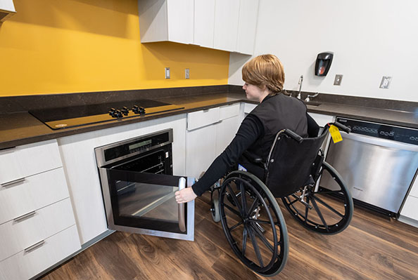The “smart apartment” on the second floor, complete with voice-activated devices, is designed for training students to assist people with limited mobility in their daily activities.